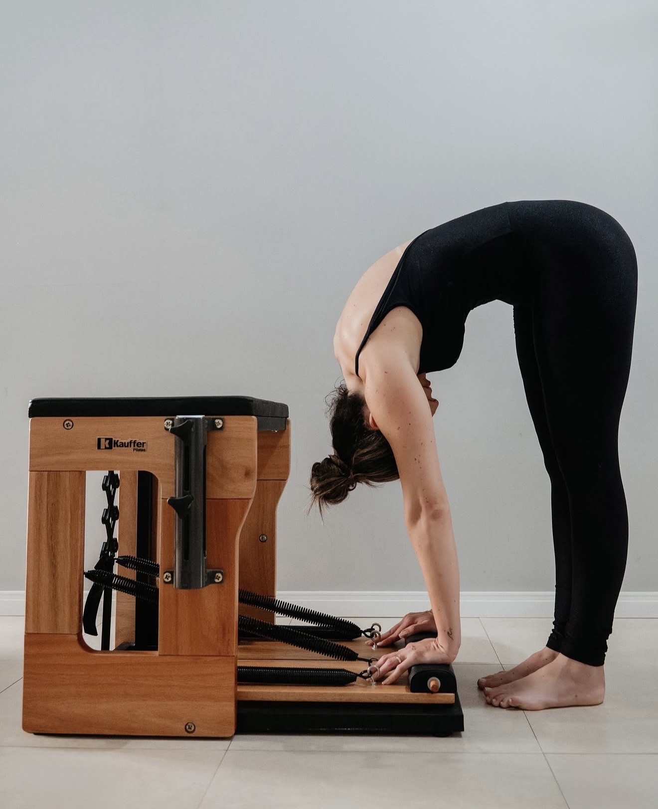 Paty Zaleski em movimento de Pilates
